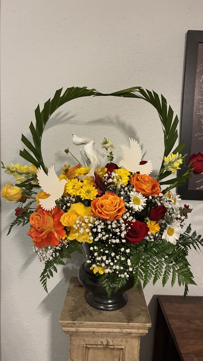 A comforting sympathy arrangement with doves
